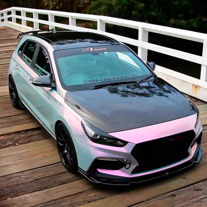 Sporty hatchback featuring glossy Silver Sunset vinyl wrap