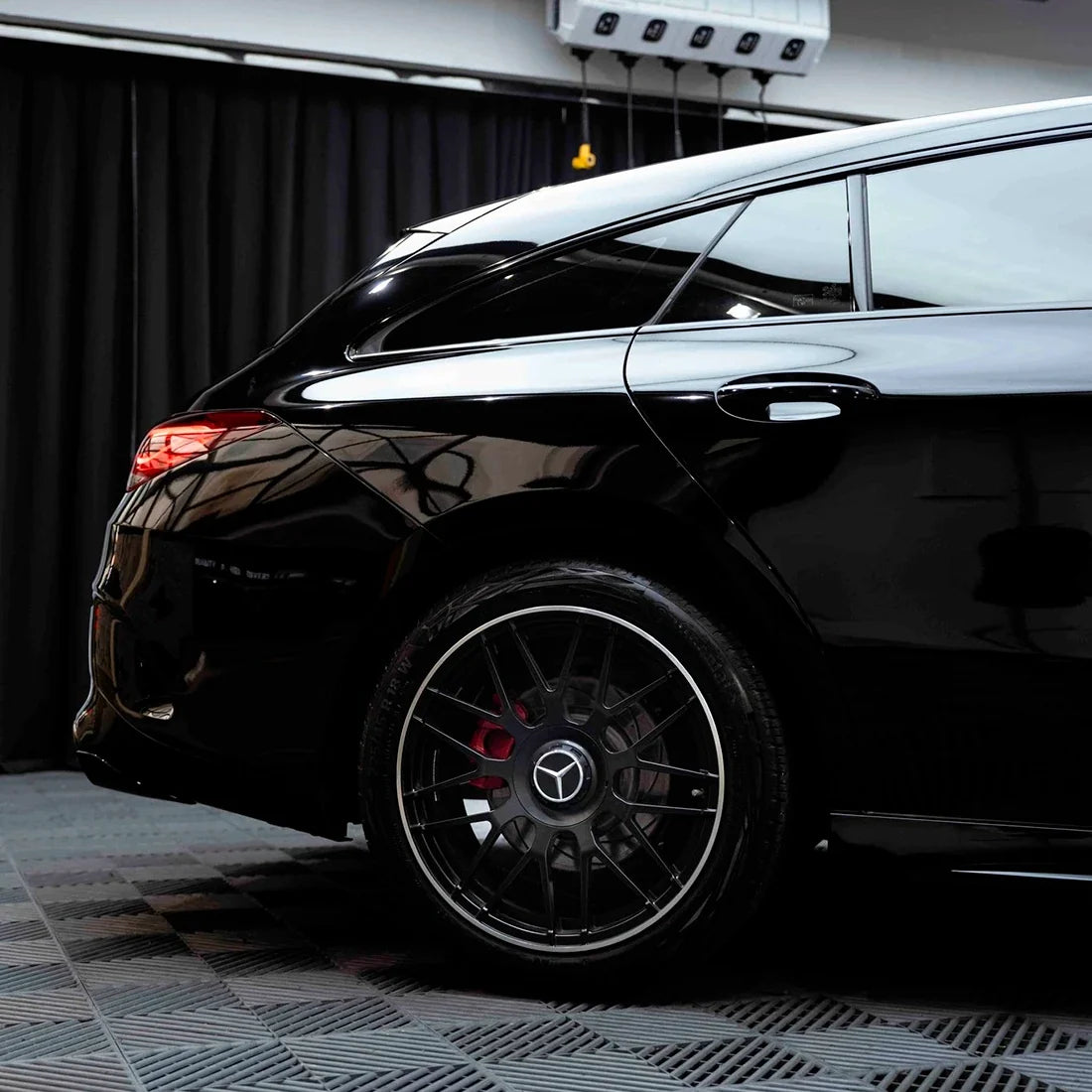 Mercedes Benz quarter panel in Black Gloss Vinyl Wrap