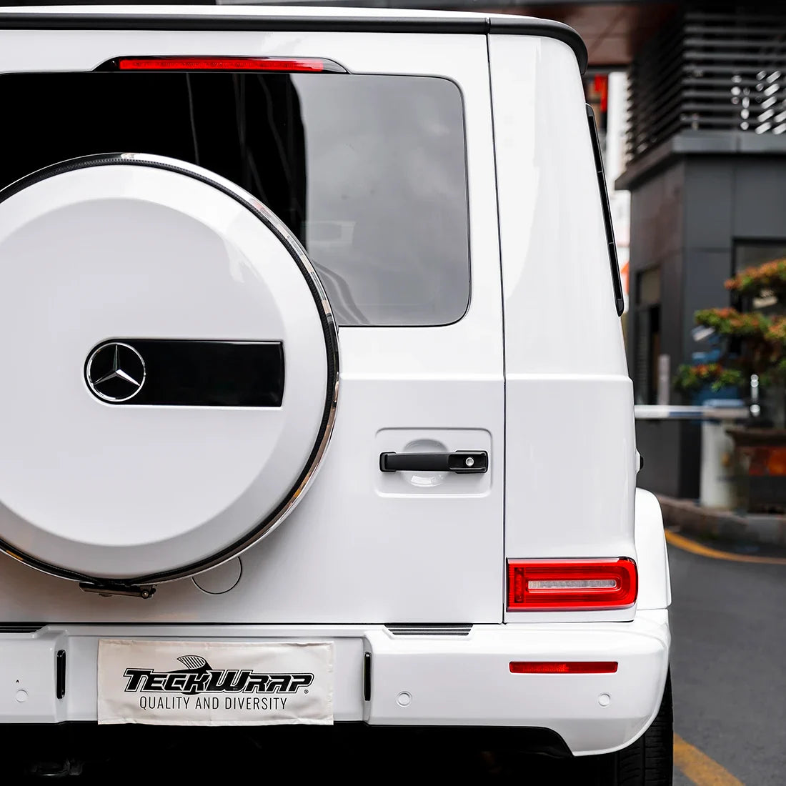 Rear view of Mercedes wrapped in High Gloss White Vinyl Wrap