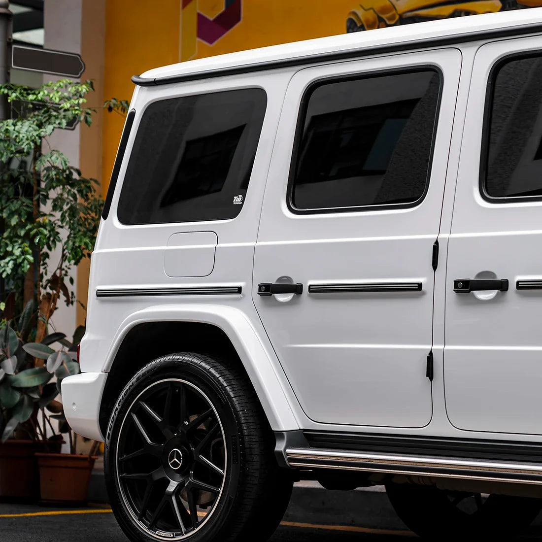 Rear side of Mercedes in High Gloss White Vinyl Wrap