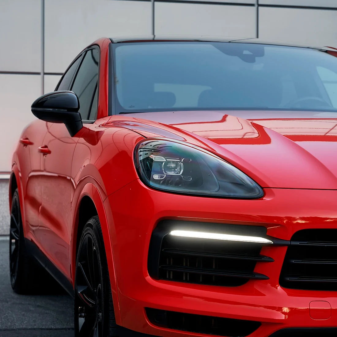 Porsche closeup in High Gloss Racing Red Vinyl Wrap