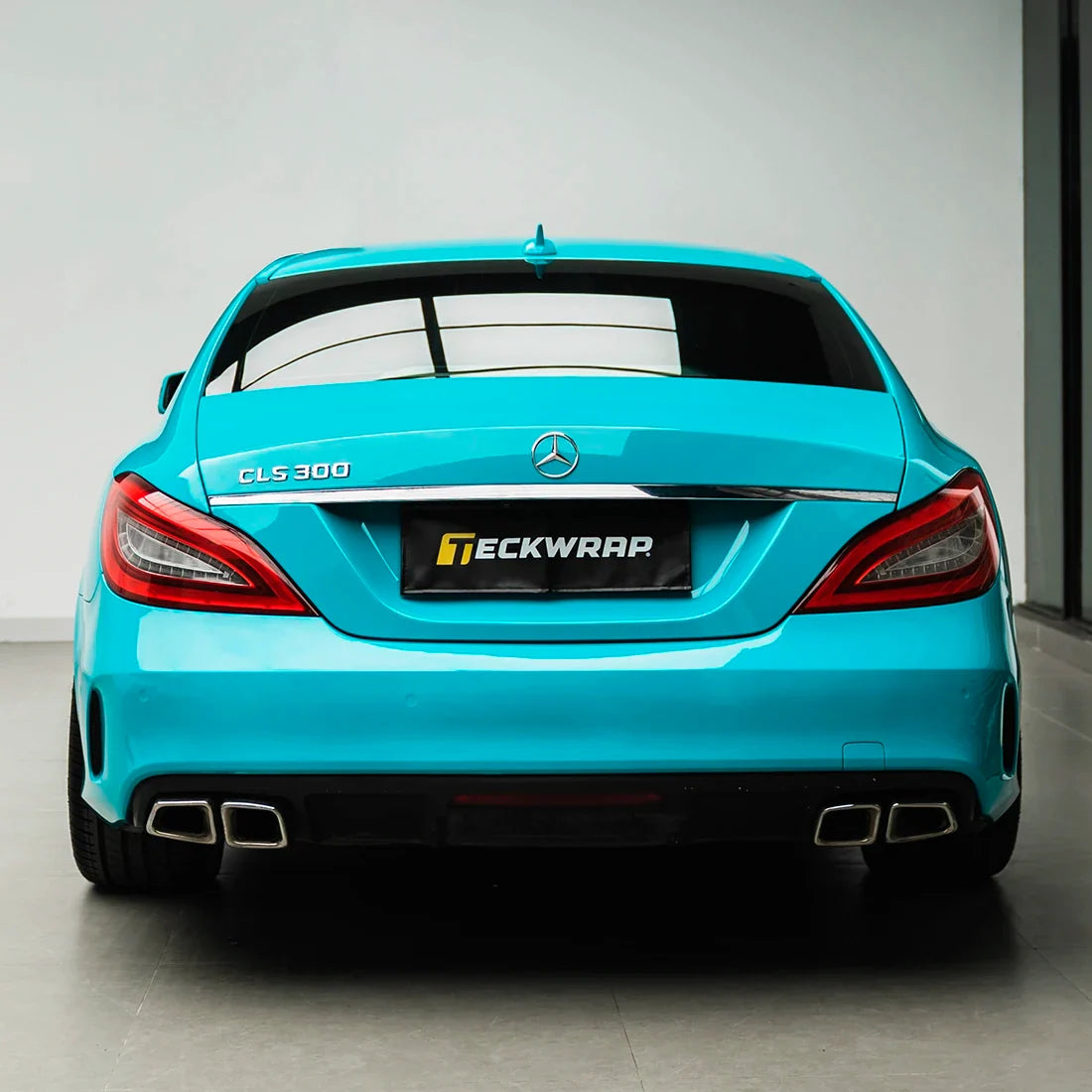 Mercedes-Benz rear view inHigh Gloss Rolling Sea Vinyl Wrap finish.