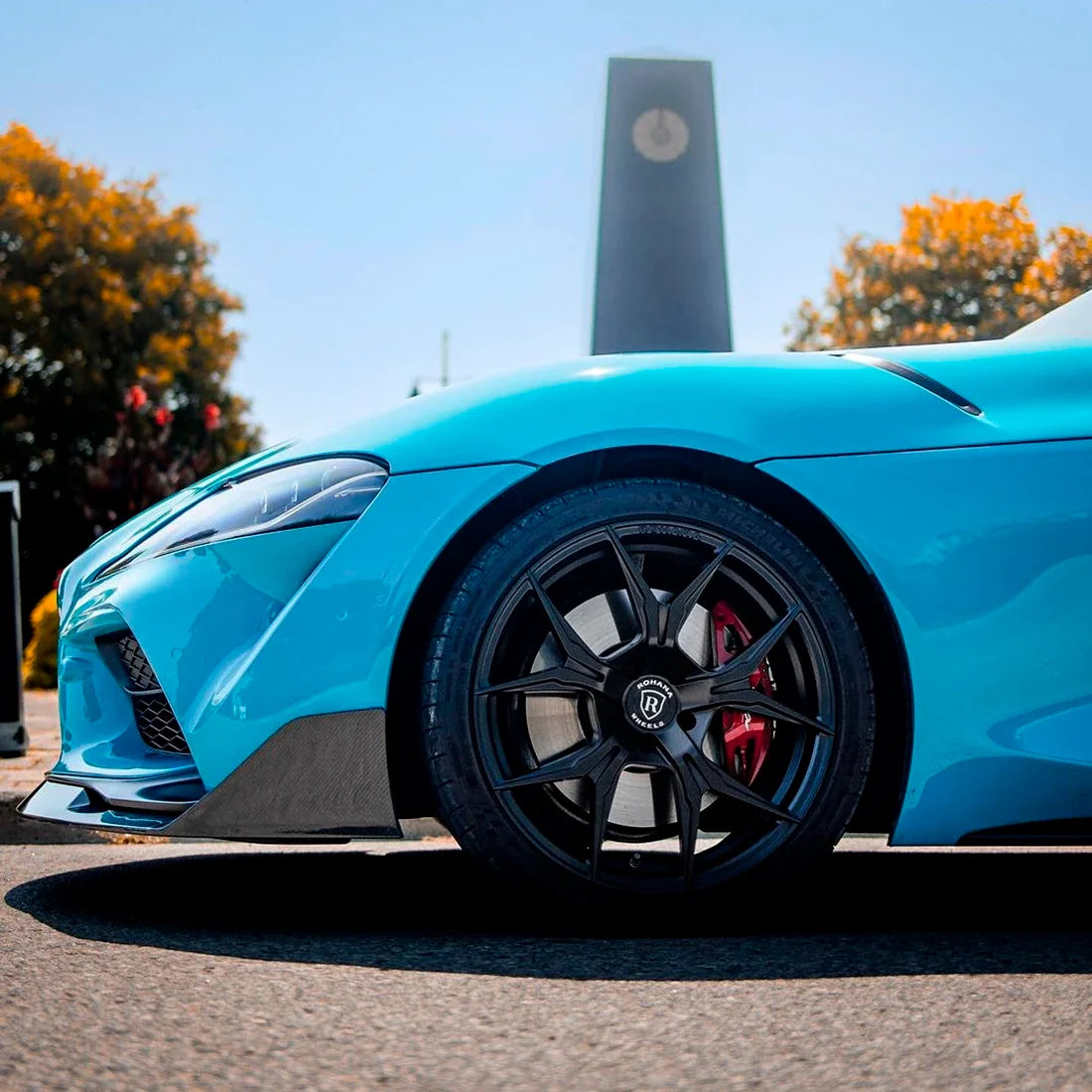 Toyota Supra fender in High Gloss Rolling Sea Vinyl Wrap