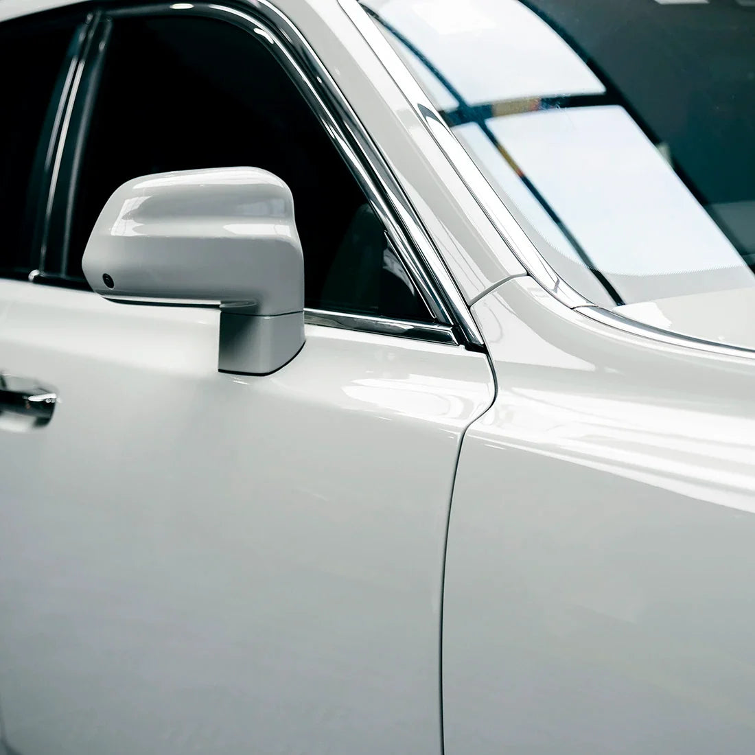 High Gloss Pale Celadon Vinyl Wrap on Rolls Royce Fender View