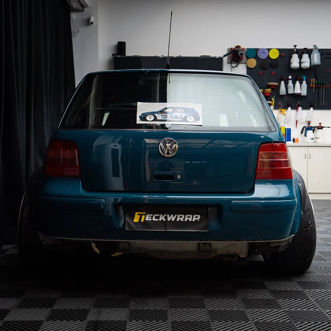 High Gloss Avalon Teal Vinyl Wrap on Golf Rear View