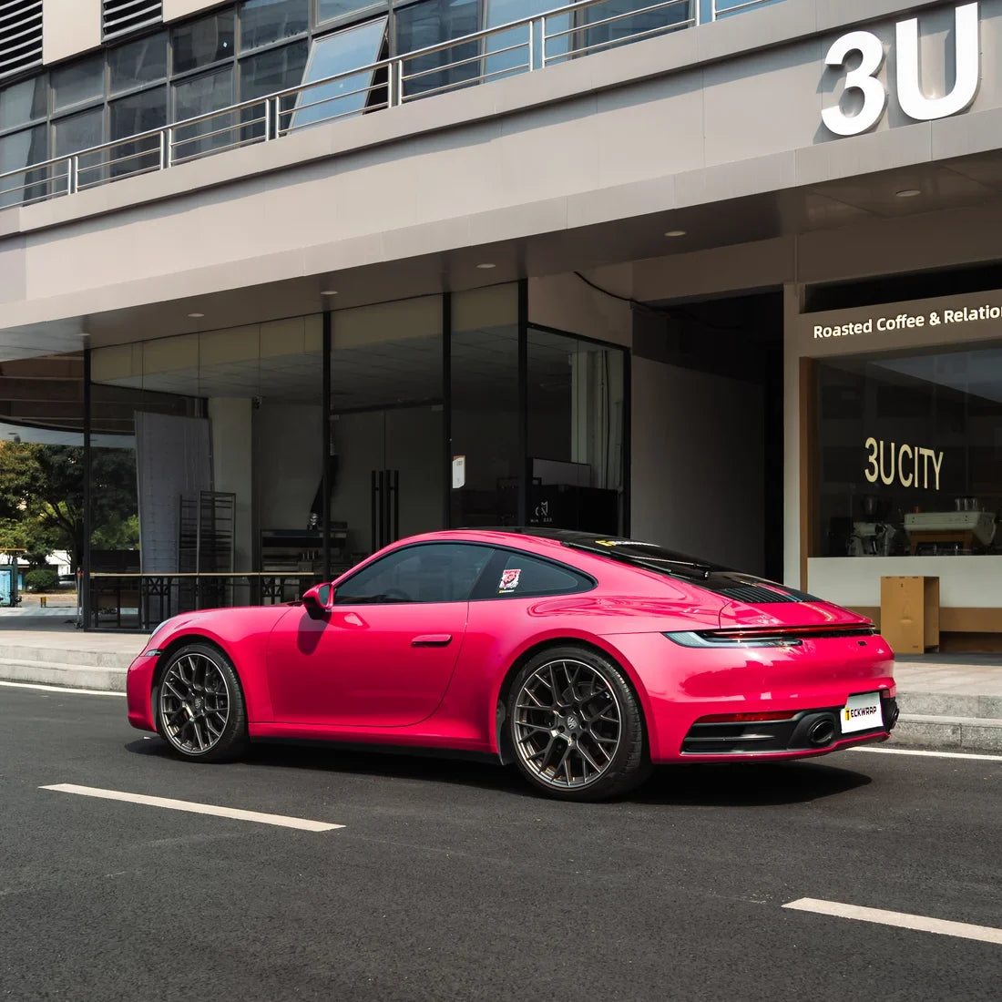 Porsche showcasing High Gloss Berry Red Vinyl Wrap