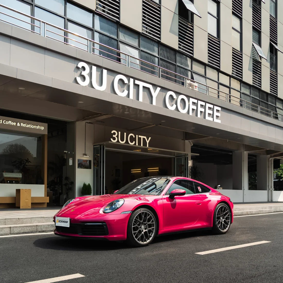 Porsche finished in a High Gloss Berry Red Vinyl Wrap