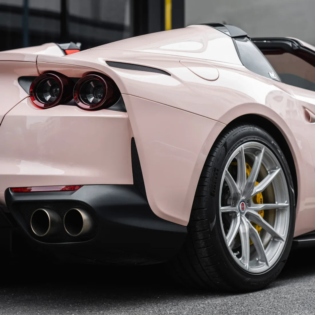 Ferrari in High Gloss Strawberry Milk Vinyl Wrap