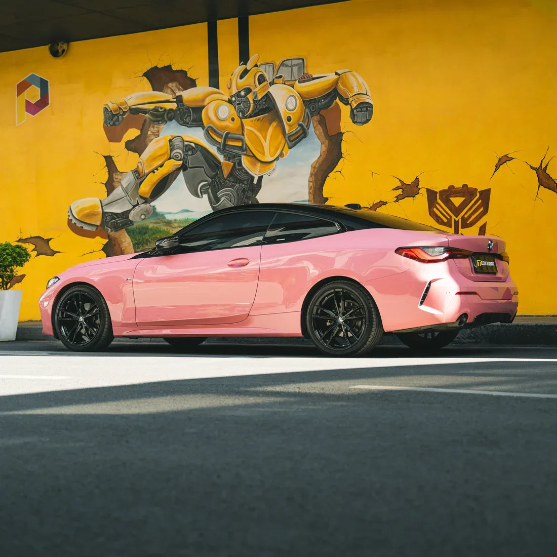 BMW in High Gloss Flamingo Pink Vinyl Wrap.