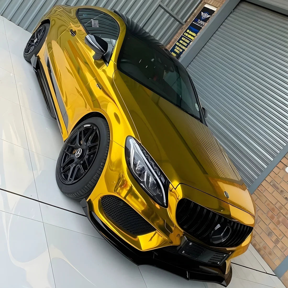 Mercedes featuring Yellow Gold Mirror Chrome vinyl wrap.