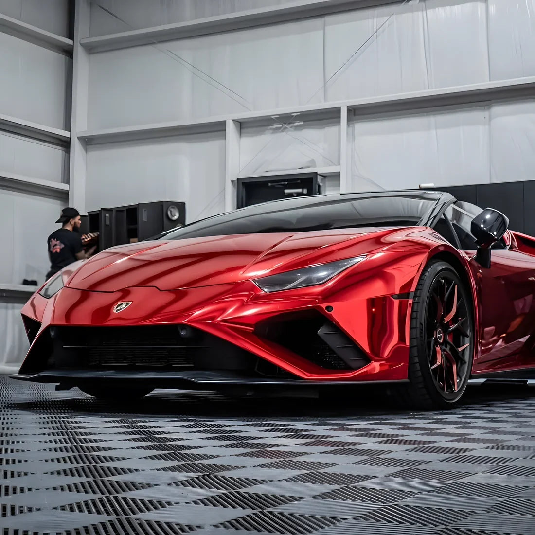 Cherry Red Mirror Chrome vinyl wrap Lamborghini with a vibrant reflective finish.