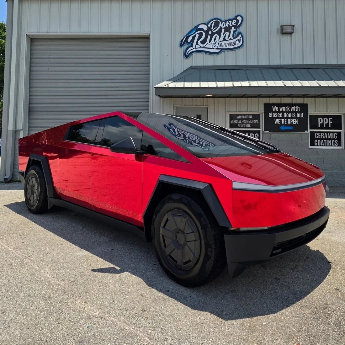 Cherry Red Mirror Chrome vinyl wrap Tesla with a glossy red chrome exterior.