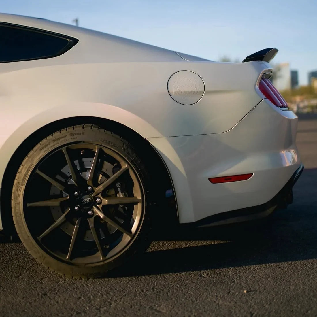 High-Gloss Chameleon Creamrose Pearl Vinyl Wrap mustang with tyre