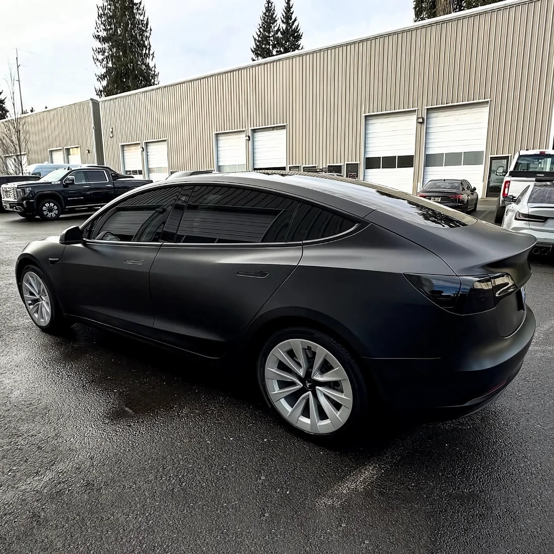 Super Satin Raven Black car wrap on Tesla