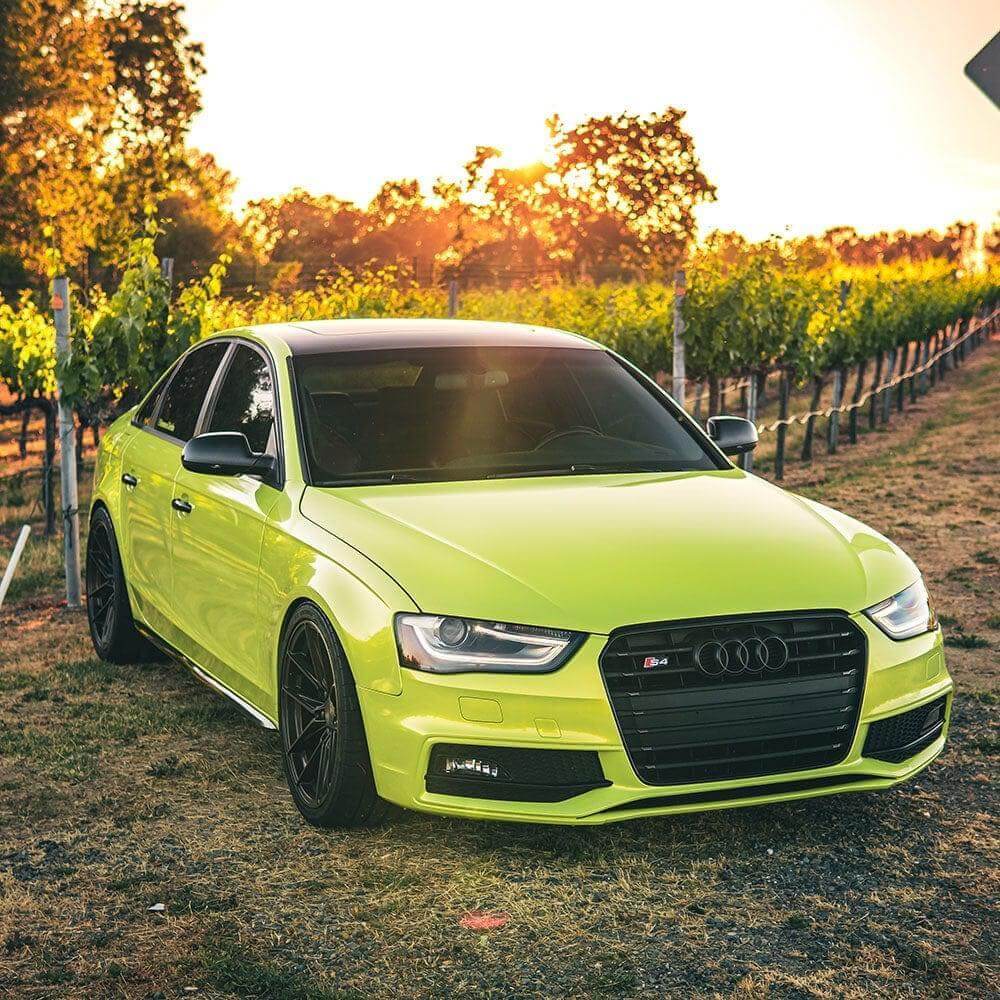 Green car wrap on super car