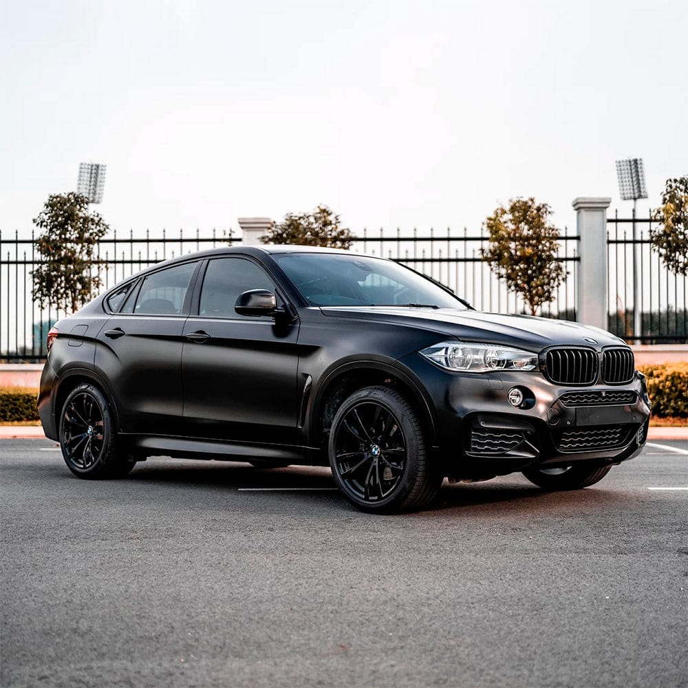 BMW SUV wrapped with Sable Black Matte Vinyl Wrap