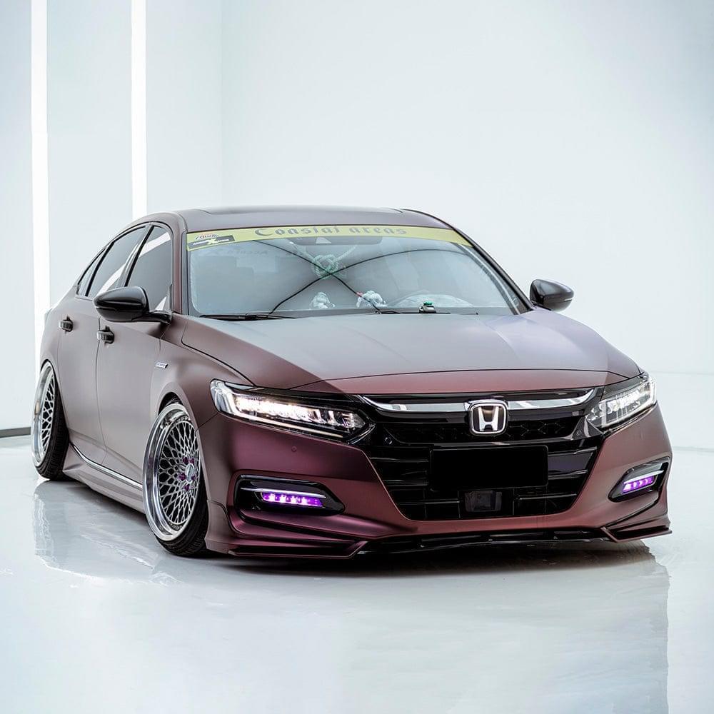 Studio shot of a Honda sedan wrapped in TeckWrap Satin Burnt Maroon Vinyl Wrap