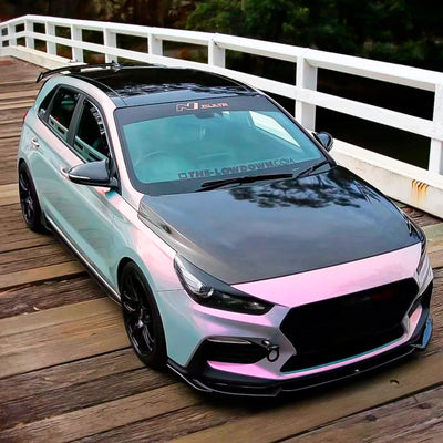 Sporty hatchback featuring glossy Silver Sunset vinyl wrap