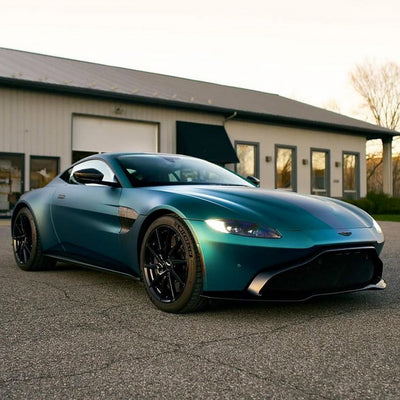 Aston Martin sports car in Jewel Green Satin Metallic vinyl wrap