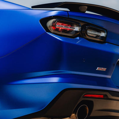 Corner of Chevrolet Camaro Satin Metallic Rasant Blue Vinyl Wrap
