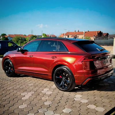 Audi Q8 showcasing Ultra Gloss Supreme Red Vinyl Wrap