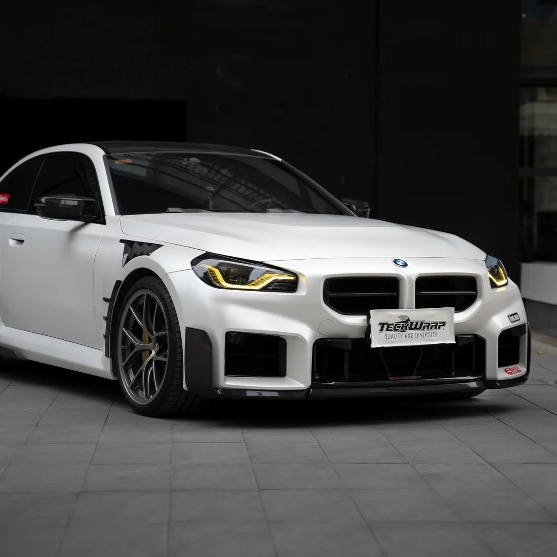 white satin matte vinyl wrap on BMW front view