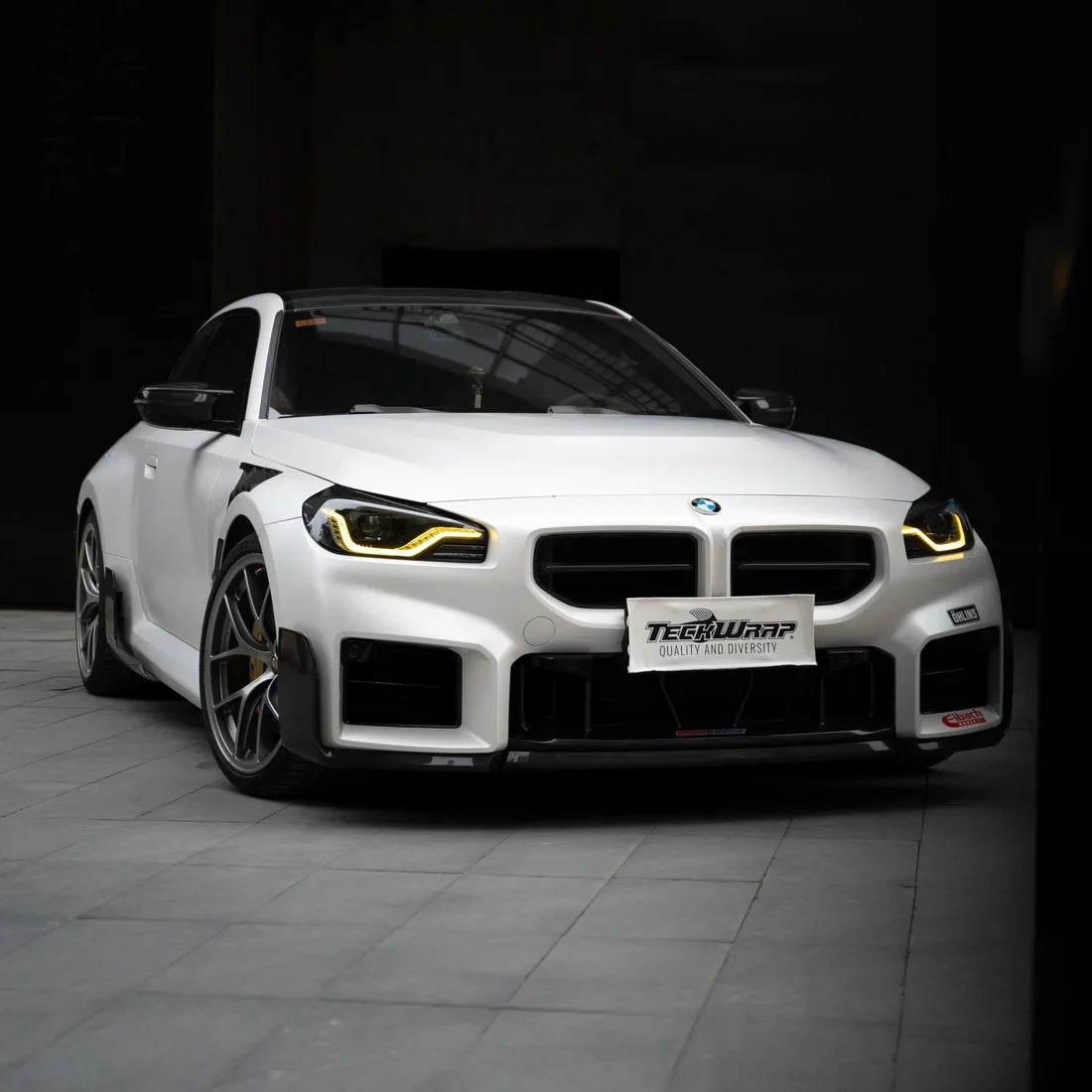 white satin matte vinyl wrap on BMW front view