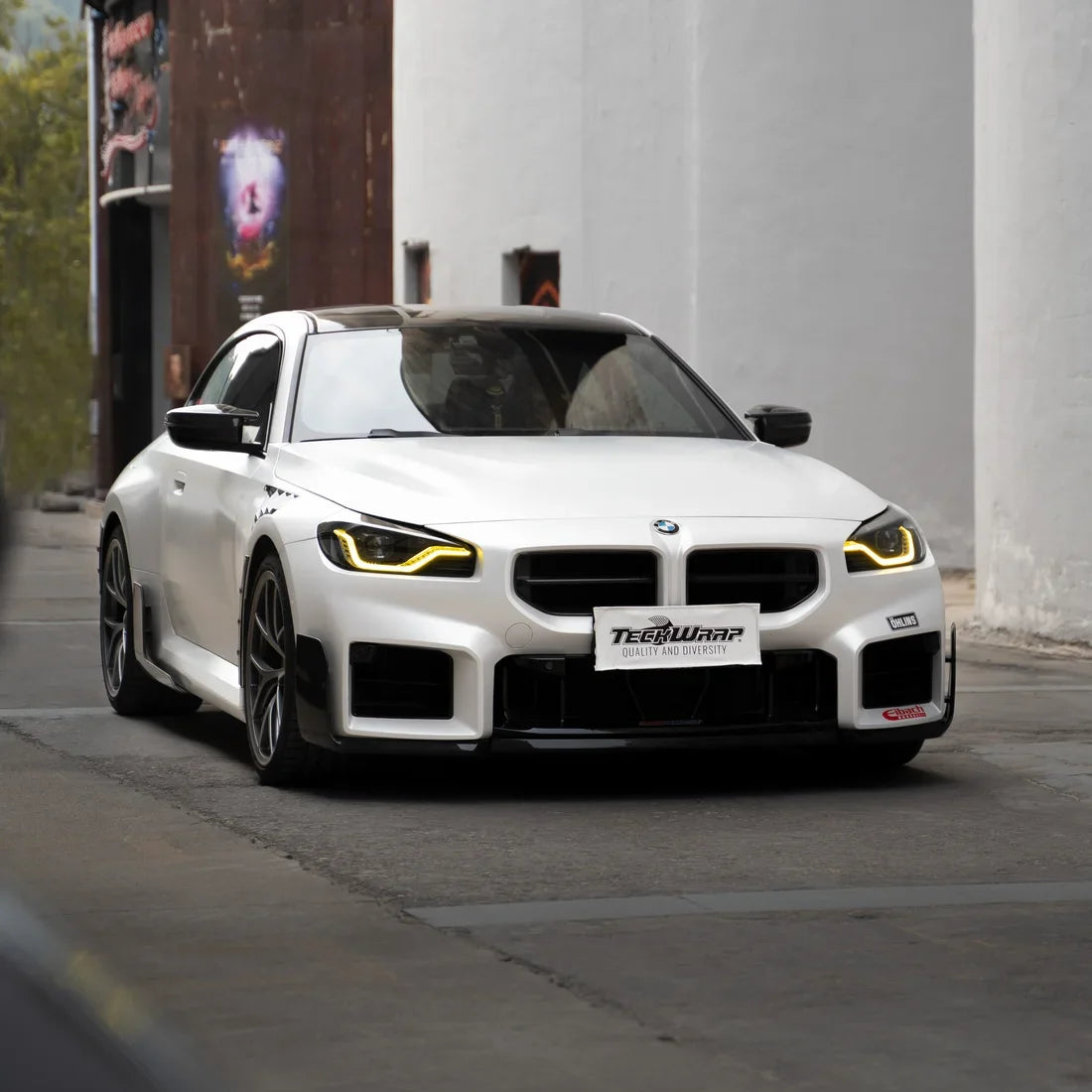 White satin matte vinyl wrap on the BMW