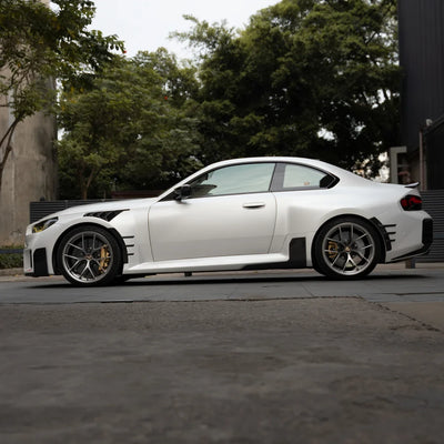 White satin matte vinyl wrap side look on car