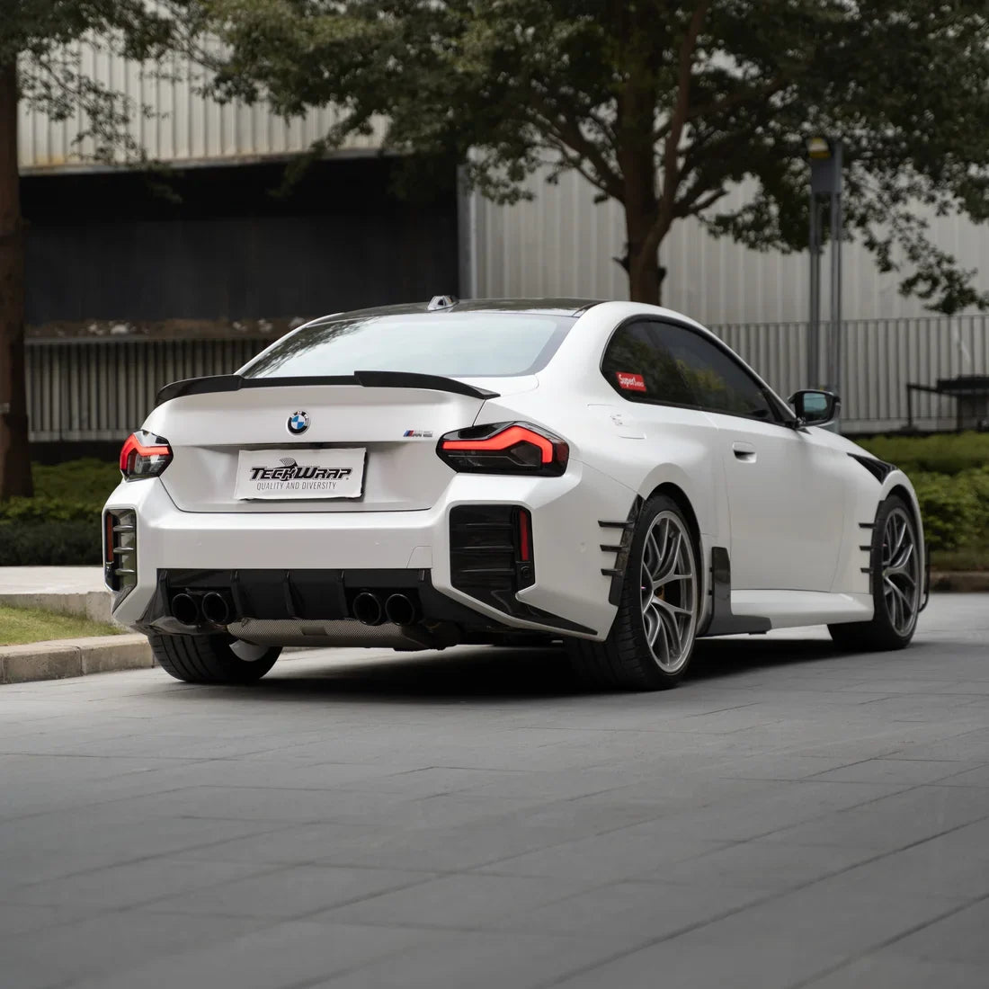 White Satin Matte Vinyl wrap on BMW rear, Side view
