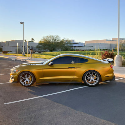 Side profile of Ford Mustang in Satin Golden Yellow Vinyl Wrap