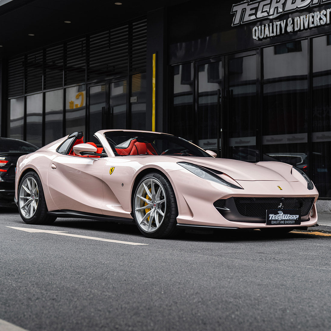 Ferrari wrapped in High Gloss Strawberry Milk Vinyl Wrap