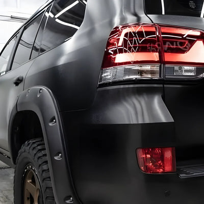 Carbon Brushed Black Vinyl Wrap covering a car.