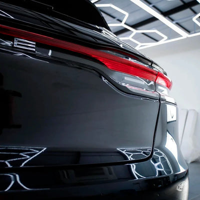 Porsche rear close-up in Black Gloss Vinyl Wrap