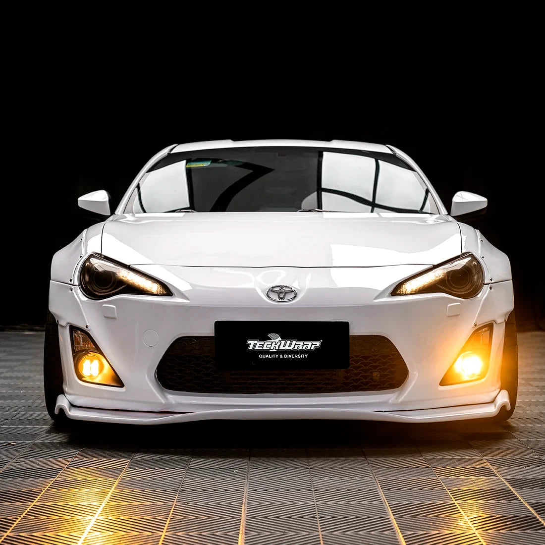 Front view of Toyota in High Gloss White Vinyl Wrap