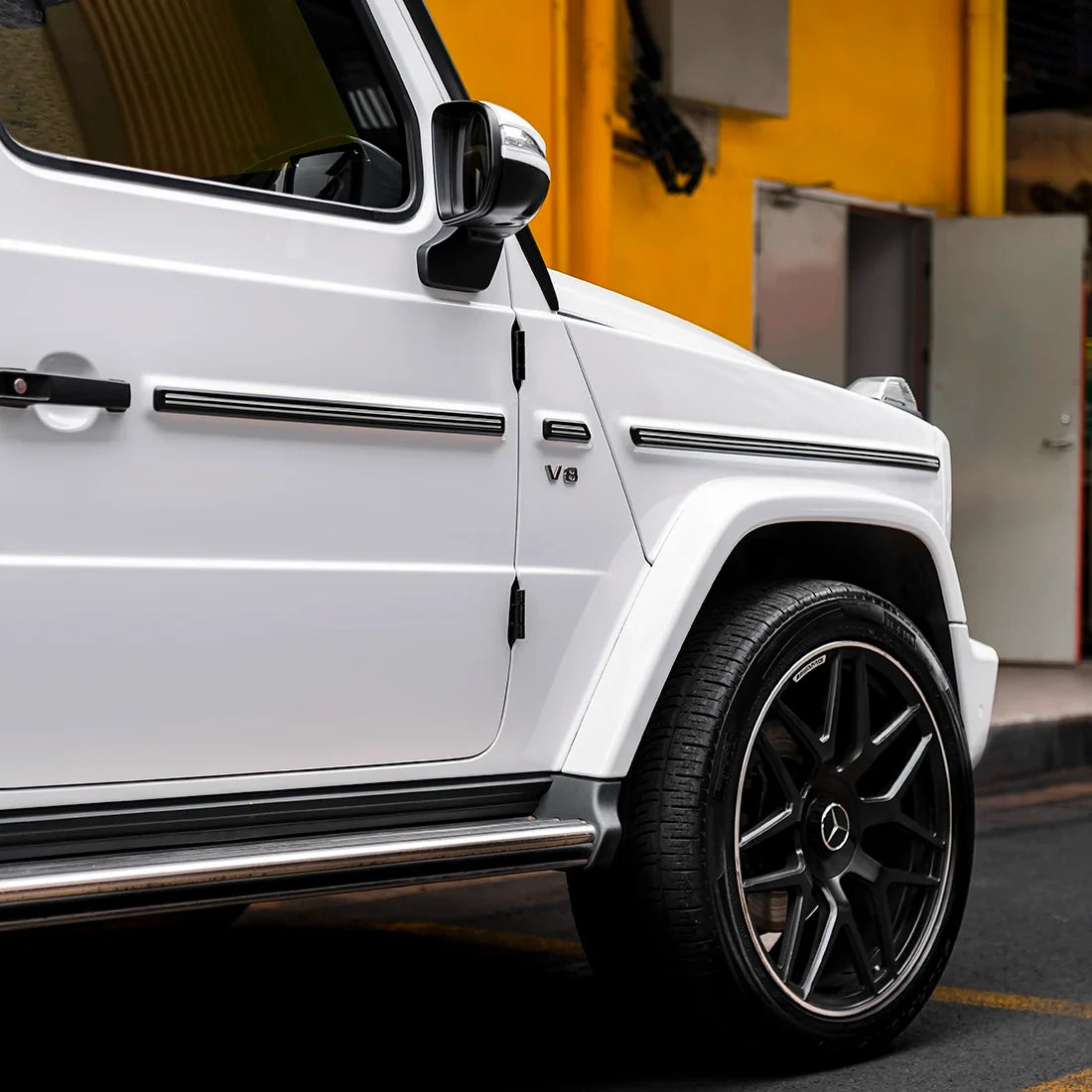Side detail of Mercedes wrapped in High Gloss White Vinyl Wrap