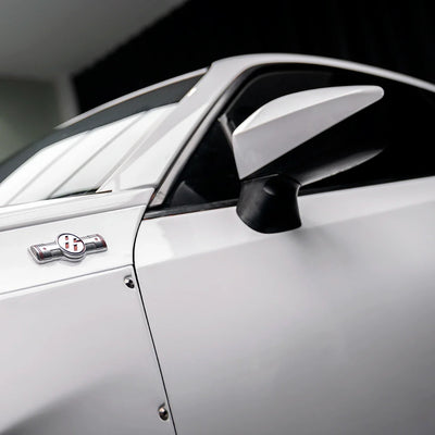 Close-up of Toyota side mirror High Gloss White Vinyl Wrap