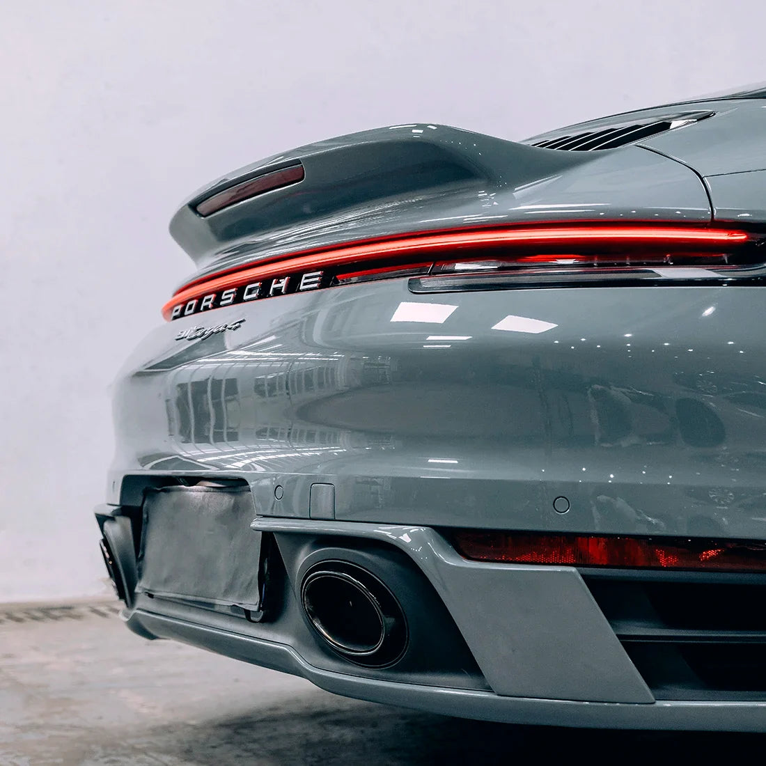 Porsche rear bumper in High Gloss Amazon Grey Vinyl Wrap