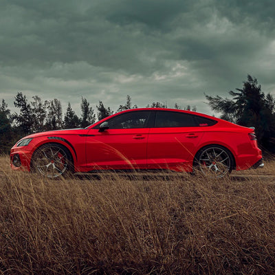Audi side view in High Gloss Racing Red Vinyl Wrap