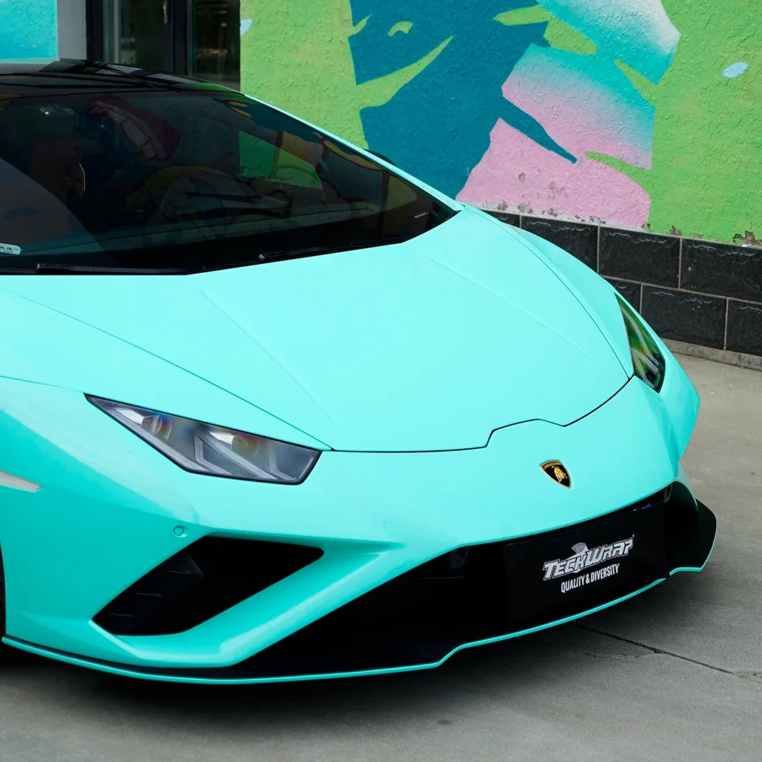 Lamborghini bumper in High Gloss Tiffany Green Vinyl Wrap