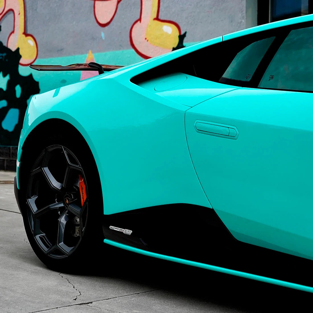 Lamborghini quarter panel in High Gloss Tiffany Green Vinyl Wrap