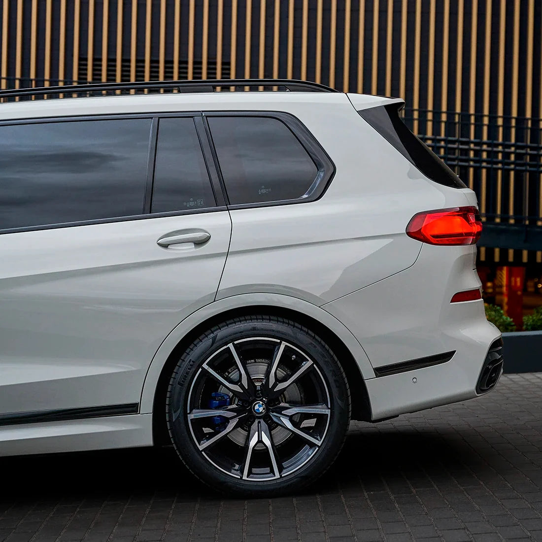 BMW quarter panel in High Gloss Slate Grey Vinyl Wrap