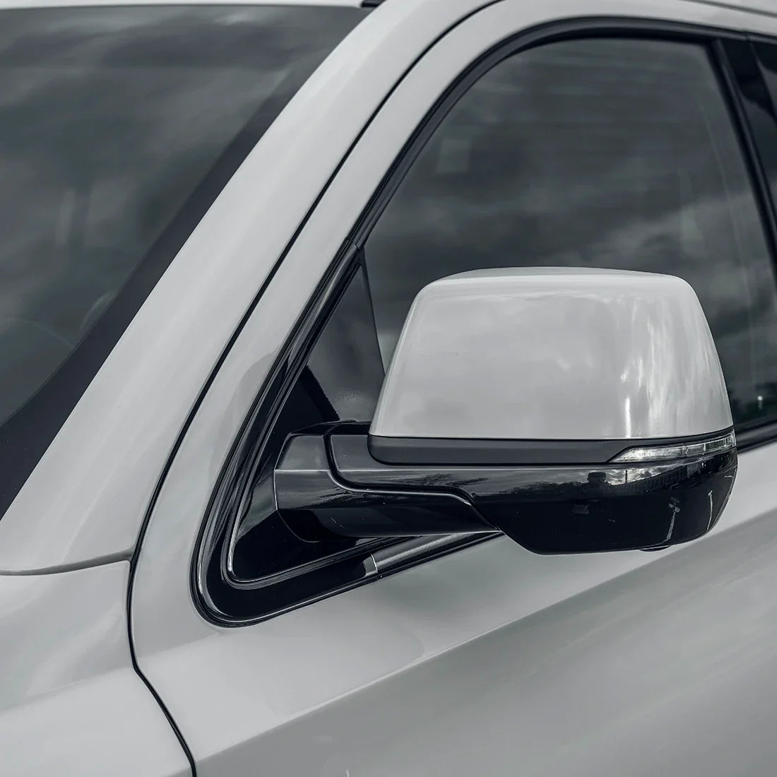 Cadillac mirror in High Gloss Slate Grey Vinyl Wrap