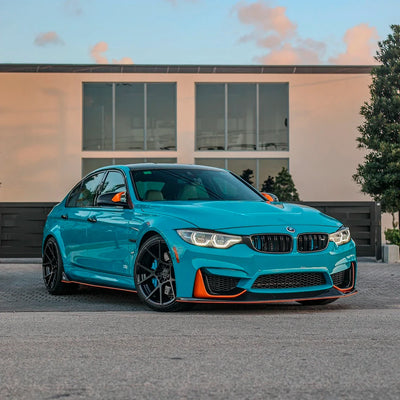 BMW car parked in High Gloss Rolling Sea Vinyl Wrap