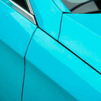 Mercedes-Benz closeup in High Gloss Rolling Sea Vinyl Wrap finish.