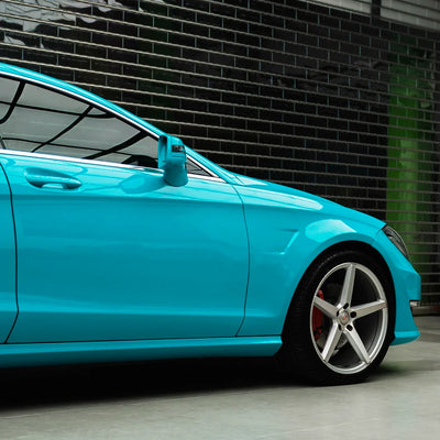 Mercedes-Benz door in High Gloss Rolling Sea Vinyl Wrap finish.