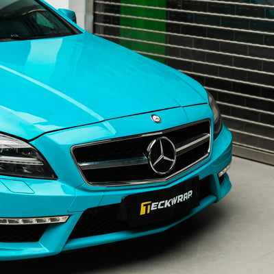 Mercedes-Benz hood in High Gloss Rolling Sea Vinyl Wrap finish.