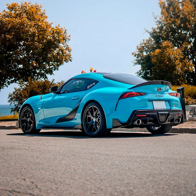 Toyota Supra rear view in High Gloss Rolling Sea Vinyl Wrap