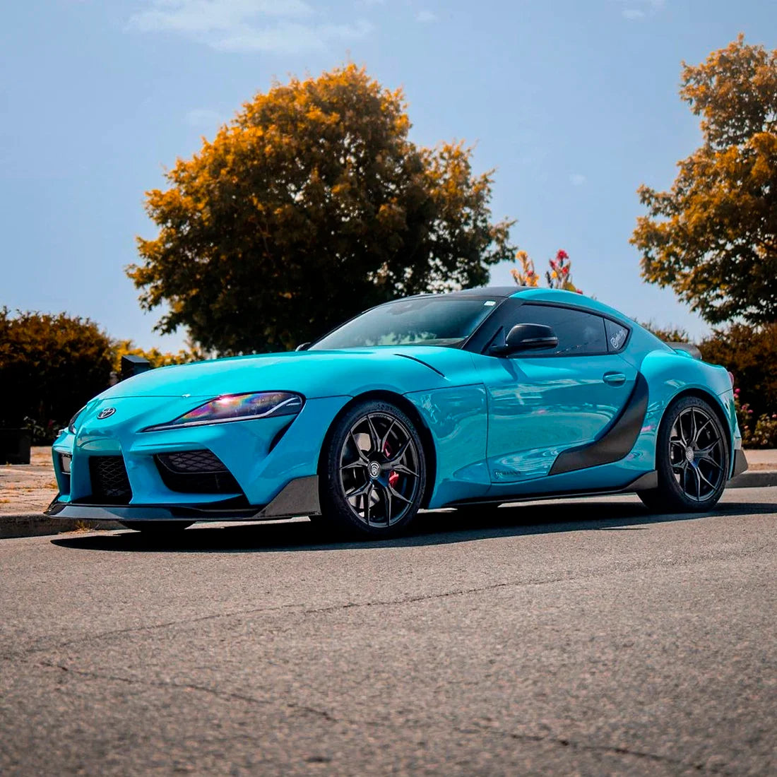 Toyota Supra view in High Gloss Rolling Sea Vinyl Wrap