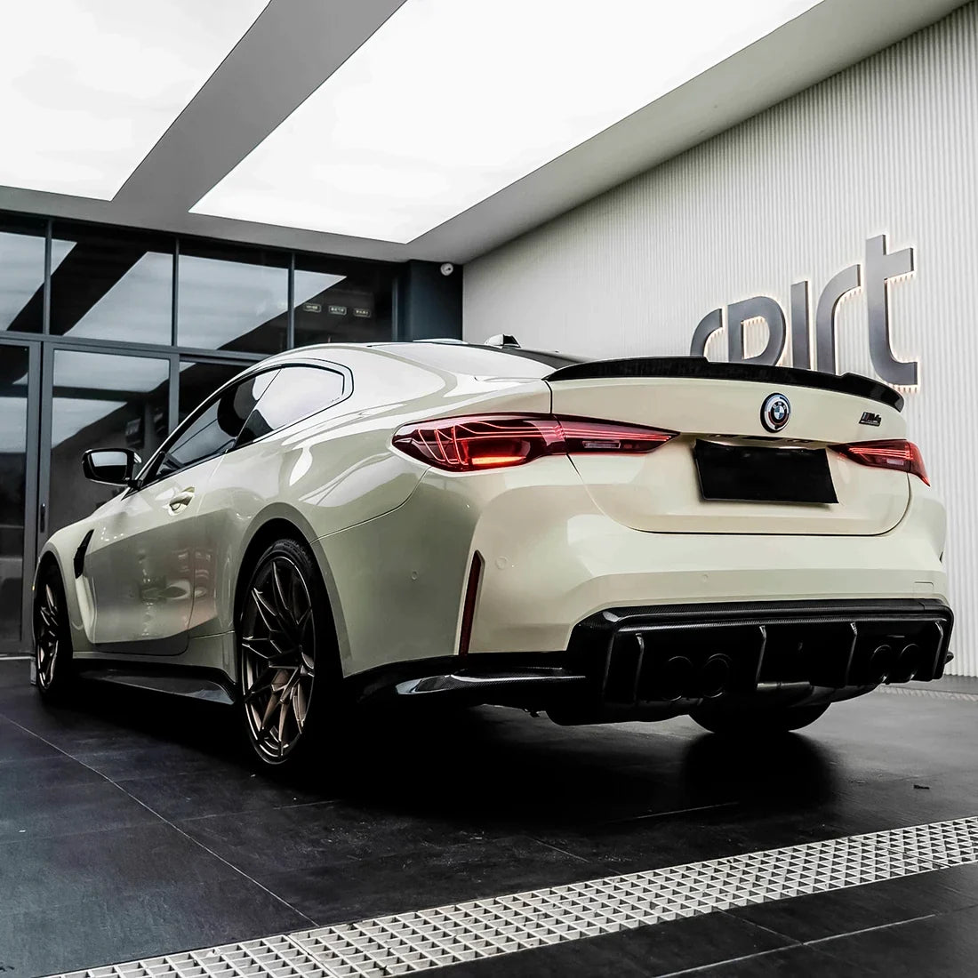 High Gloss Ivory Cream Vinyl Wrap on bmw from back look